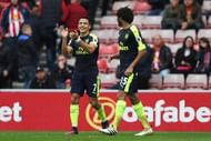 SUNDERLAND, ENGLAND - OCTOBER 29:  Alexis Sanchez (L) of Arsenal celebrates scoring his team's fourth goal with his team mate Mohamed Elneny (R) during the Premier League match between Sunderland and Arsenal at the Stadium of Light on October 29, 2016 in Sunderland, England.  (Photo by Ian MacNicol/Getty Images)